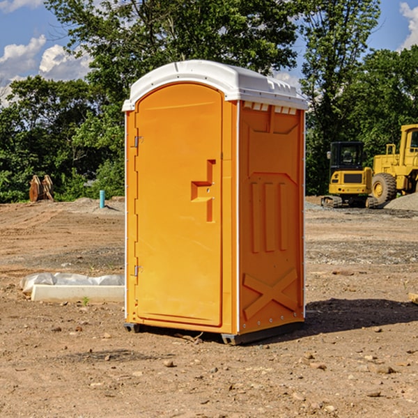 how often are the porta potties cleaned and serviced during a rental period in Hospers